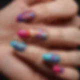 Elegant triangular nail design showcasing vibrant colors